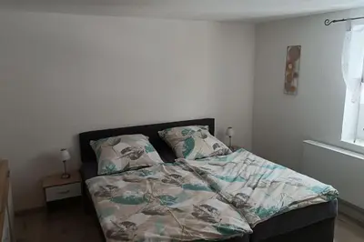 Ein Bett oder Betten in einem Zimmer der Unterkunft Ferienwohnung im Fachwerkhaus