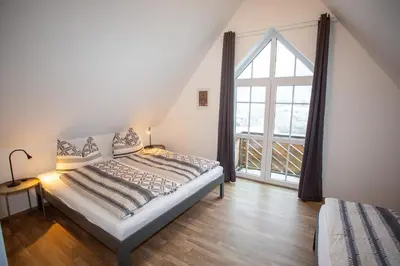 Ein Bett oder Betten in einem Zimmer der Unterkunft Ferienwohnung Zschopau Zentrum