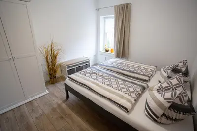 Ein Bett oder Betten in einem Zimmer der Unterkunft Ferienwohnung Zschopau Zentrum