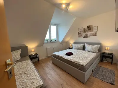 Ein Bett oder Betten in einem Zimmer der Unterkunft Wohnperle*WindbergBlick*ruhig