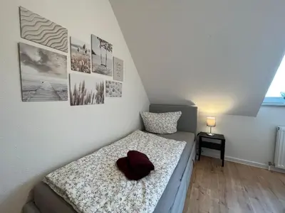 Ein Bett oder Betten in einem Zimmer der Unterkunft Wohnperle*WindbergBlick*ruhig