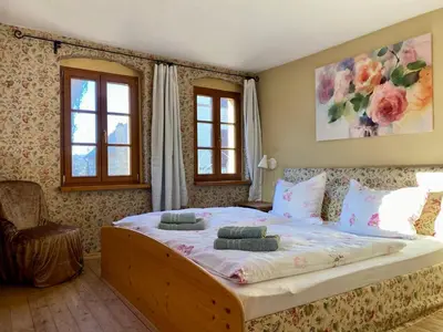 Ein Bett oder Betten in einem Zimmer der Unterkunft Fachwerkhof Klosterbuch
