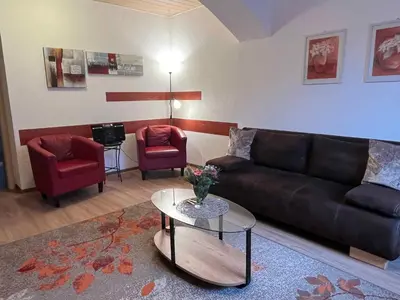 Ein Sitzbereich in der Unterkunft Apartment in Kreischa 3123