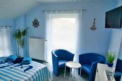 Ein Bett oder Betten in einem Zimmer der Unterkunft myCozyPlace - Zwei gemütliche Zimmer für Vier