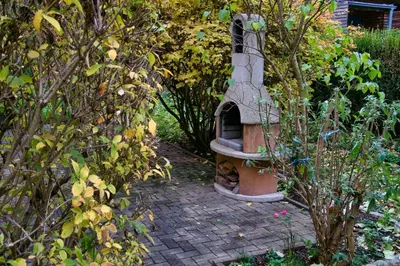 Ein Garten an der Unterkunft myCozyPlace - Zwei gemütliche Zimmer für Vier