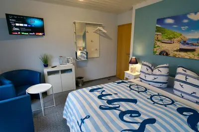 Ein Bett oder Betten in einem Zimmer der Unterkunft myCozyPlace - Zwei gemütliche Zimmer für Vier