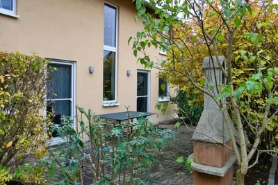 Ein Garten an der Unterkunft myCozyPlace - Gemütliches Zimmer für Zwei