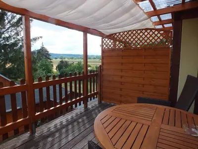 Ein Balkon oder eine Terrasse in der Unterkunft Pension am Elberadweg