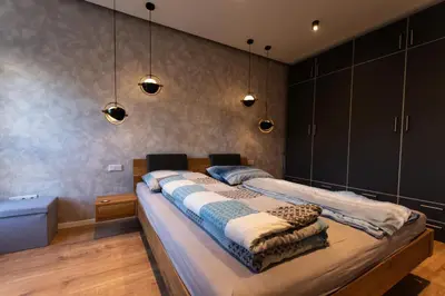 Ein Bett oder Betten in einem Zimmer der Unterkunft Ruhiges & luxuriöses Business Apartment im Zentrum