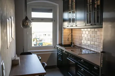 Küche/Küchenzeile in der Unterkunft Ruhiges & luxuriöses Business Apartment im Zentrum