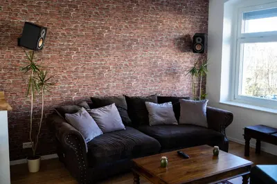 Ein Sitzbereich in der Unterkunft Ruhiges & luxuriöses Business Apartment im Zentrum