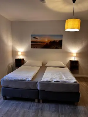 Ein Bett oder Betten in einem Zimmer der Unterkunft Landhof Belka