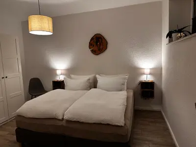 Ein Bett oder Betten in einem Zimmer der Unterkunft Landhof Belka