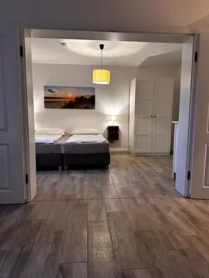 Ein Bett oder Betten in einem Zimmer der Unterkunft Landhof Belka