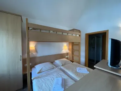Ein Bett oder Betten in einem Zimmer der Unterkunft Fährhaus Helios (ehem. Fährhaus Hesse)