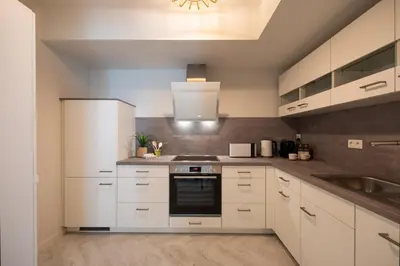 Küche/Küchenzeile in der Unterkunft Innenstadt-Apartments Klinik Friedrichstadt