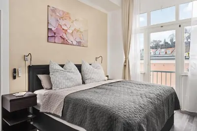 Ein Bett oder Betten in einem Zimmer der Unterkunft Meißen Altstadt SmartLuxusOase WLAN Netflix Magenta Disney+