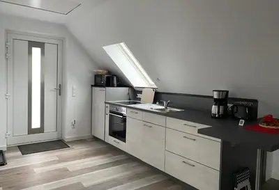 Küche/Küchenzeile in der Unterkunft Ferienhaus Helfert FeWo2 mit eigener Terrasse