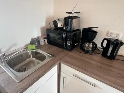 Küche/Küchenzeile in der Unterkunft Studio Apartment Frühauf Geithain