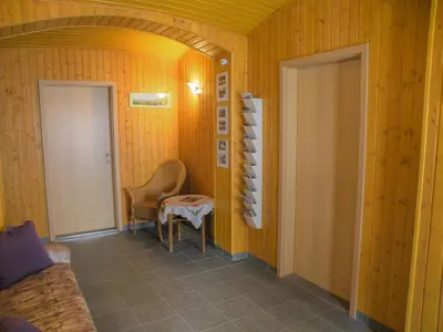Ein Sitzbereich in der Unterkunft Ferienwohnung Am Lindenbaum