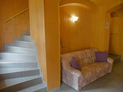 Ein Sitzbereich in der Unterkunft Ferienwohnung Am Lindenbaum