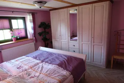 Ein Bett oder Betten in einem Zimmer der Unterkunft Fewo Zeittor