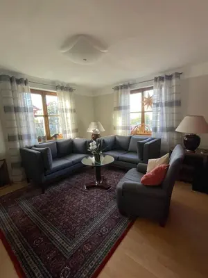 Ein Sitzbereich in der Unterkunft Ferienwohnung Schneider