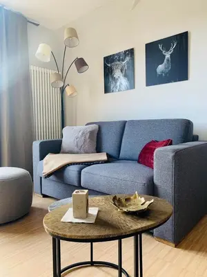 Ein Sitzbereich in der Unterkunft Ferienwohnung Villa Grützner