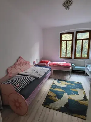 Ein Bett oder Betten in einem Zimmer der Unterkunft Lilienstein