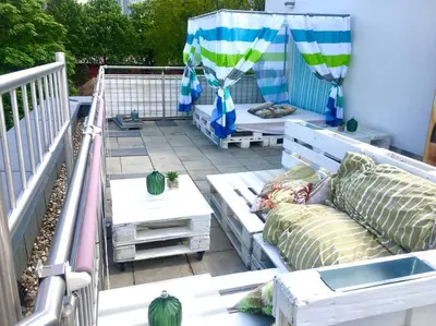 Ein Balkon oder eine Terrasse in der Unterkunft VIP Design Apartment m. Dachterrasse