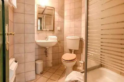Ein Badezimmer in der Unterkunft Pension Rauschenstein