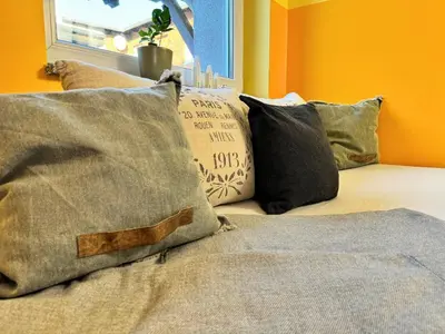 Ein Bett oder Betten in einem Zimmer der Unterkunft Pension am Plan