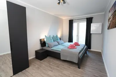 Ein Bett oder Betten in einem Zimmer der Unterkunft Supreme City Dream mit Terrasse und Parkplatz - 110m²