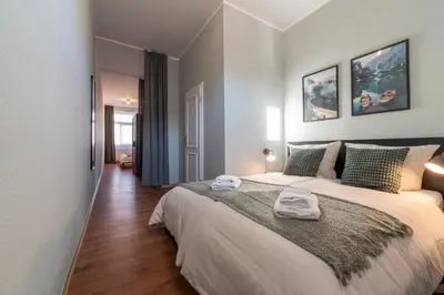 Ein Bett oder Betten in einem Zimmer der Unterkunft REGENT Neu! Wlan-Netflix-Küche- Meißen Altstadt-SBahn-DD, Elbufer