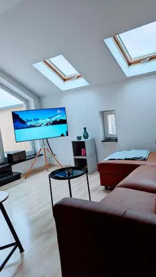 TV/Unterhaltungsangebot in der Unterkunft Rooftop Art Apartment, E-Roller,Ausblick,WLAN,TV, Netflix