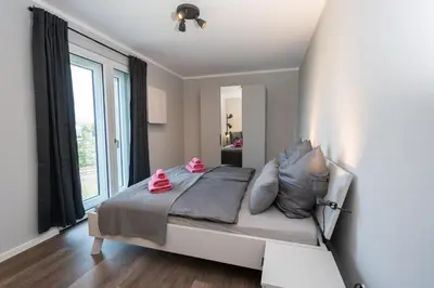 Ein Sitzbereich in der Unterkunft Cozy City Dream Apartment mit Terrasse und Parkplatz - 90m²