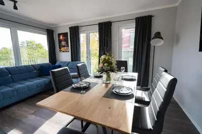 Ein Sitzbereich in der Unterkunft Cozy City Dream Apartment mit Terrasse und Parkplatz - 90m²