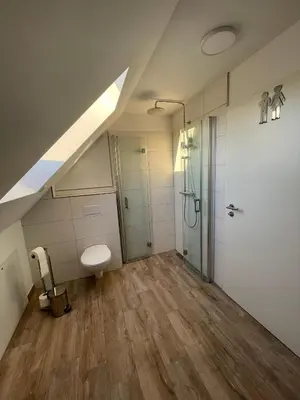Ein Badezimmer in der Unterkunft Ferienhaus Helfert Fewo DG mit Terrasse