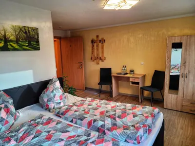 Ein Bett oder Betten in einem Zimmer der Unterkunft Kulturstätte Gröditz