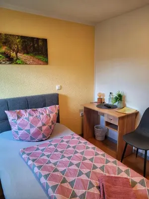 Ein Bett oder Betten in einem Zimmer der Unterkunft Kulturstätte Gröditz