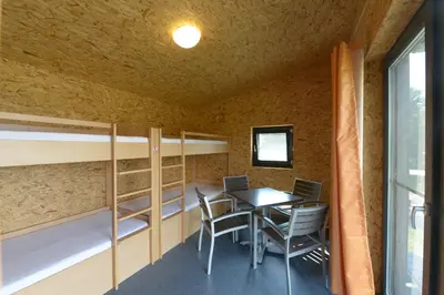 Ein Bett oder Betten in einem Zimmer der Unterkunft Hafencamp Senftenberger See