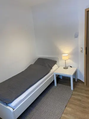 Ein Bett oder Betten in einem Zimmer der Unterkunft Ferienwohnung Kornkäfer 3