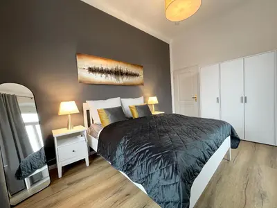 Ein Bett oder Betten in einem Zimmer der Unterkunft Wohnung in Radebeul