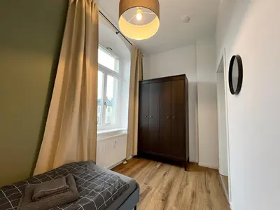 Ein Bett oder Betten in einem Zimmer der Unterkunft Wohnung in Radebeul