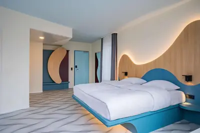 Ein Bett oder Betten in einem Zimmer der Unterkunft Prize by Radisson, Dresden Mitte