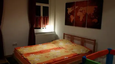 Ein Bett oder Betten in einem Zimmer der Unterkunft Ferienwohnung Paschke Chemnitz Schönau