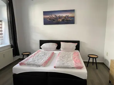 Ein Bett oder Betten in einem Zimmer der Unterkunft Ferienwohnung 3S Real Estate