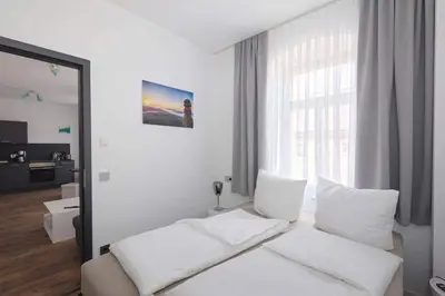 Ein Bett oder Betten in einem Zimmer der Unterkunft Ferienquartier- Forsthaus