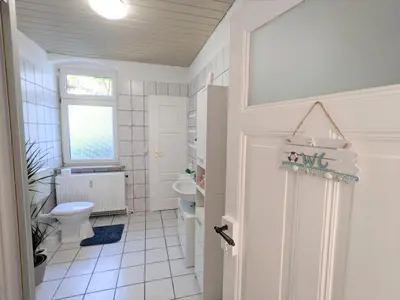 Ein Badezimmer in der Unterkunft R1 - Urlaubsmagie - Bad Schandau fußläufig, Garten