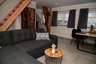 Ein Sitzbereich in der Unterkunft Ferienwohnung am Kalten Bach